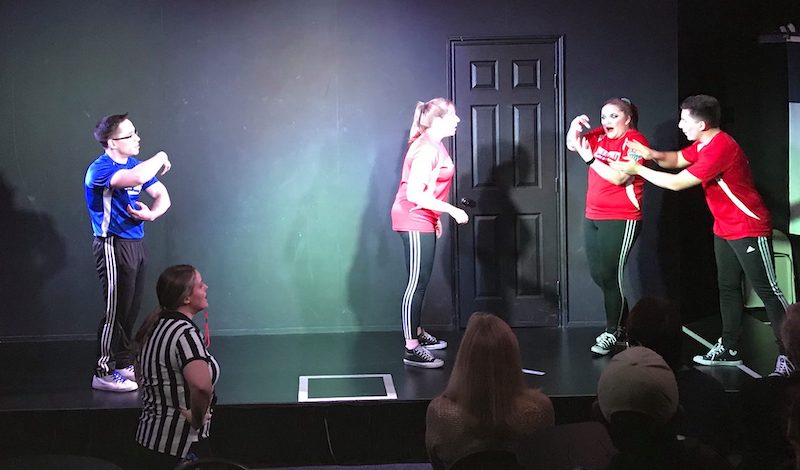 Michael, Morgan, Bailey, and Eric perform a scene at ComedySportz San Antonio
