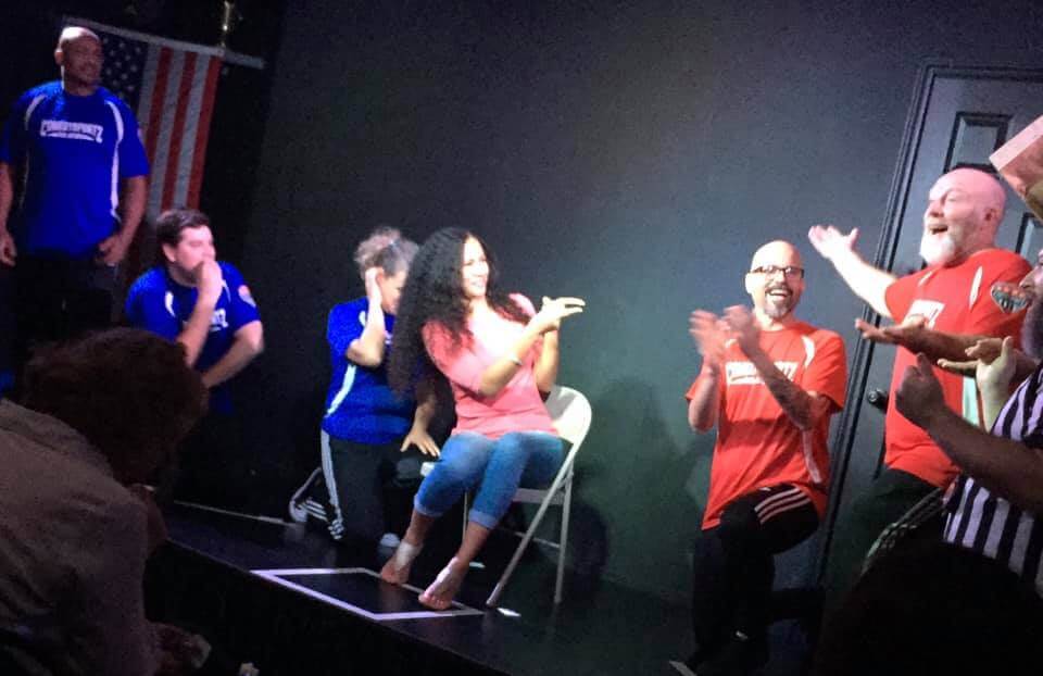 Volunteer Player Monica being wooed during a game of Cassanova